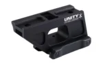 UNITY FAST COMP black optic mount, angled side view with top rail slots and white branding