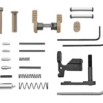 ARMASPEC SPR LT GUN BLDRS KIT FDE, flat lay of tan, black and silver pins, springs and tools