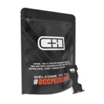 C&H PLT FOR GLK G6 TO DPP/EFLX black plate beside black branded pouch, front view