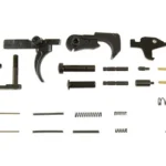 KAK AR-15 LPK NO GRIP/TRIGGER GUARD top view of black and metallic parts, pins and springs laid out
