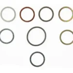 WILSON SHIM KIT RT MB WHISPER 5/8X24, top view of eight assorted metal rings