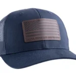 Magpul Standard Leather Patch Trucker navy cap, front view with flag patch and mesh back