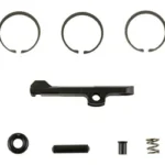 Doublestar Corp. DBST Bolt Rebuild Kit, overhead view of rings, pin, spring and small metal parts