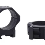 RITON 34MM LIGHT PCTNNY RNGS, black angled view of two scope rings with mounting clamps