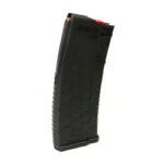 Hexmag Carbon Fiber black rifle magazine, angled side view with textured body and red follower