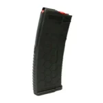 HEXMAG CARBON FIBER black curved magazine, angled side view with textured body and red follower