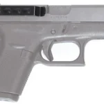 TECHNA Clip for Glock 42 Ambi black belt clip mounted along the right side of a grey pistol