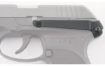 Techna Clip Ruger LCP LH black clip mounted on left side of grey pistol, close-up view