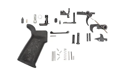 primary-19565 SPIKE'S LPK STANDARD 556 BLK, black grip, trigger and assorted small parts laid out