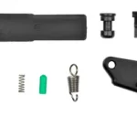Apex SHLD Action Enhancement Trigger Kit, black trigger and assorted springs and parts, top view