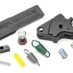 APEX FLAT FRWRD SET SEAR TRGGR KIT, black trigger assembly with plate, springs and small parts