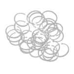 Luth-AR LUTH AR BOLT GAS RINGS, pile of silver metal rings on white