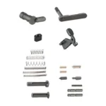 Luth-AR Lower Parts Kit Builder, top view of assorted black and metallic pins, springs and controls