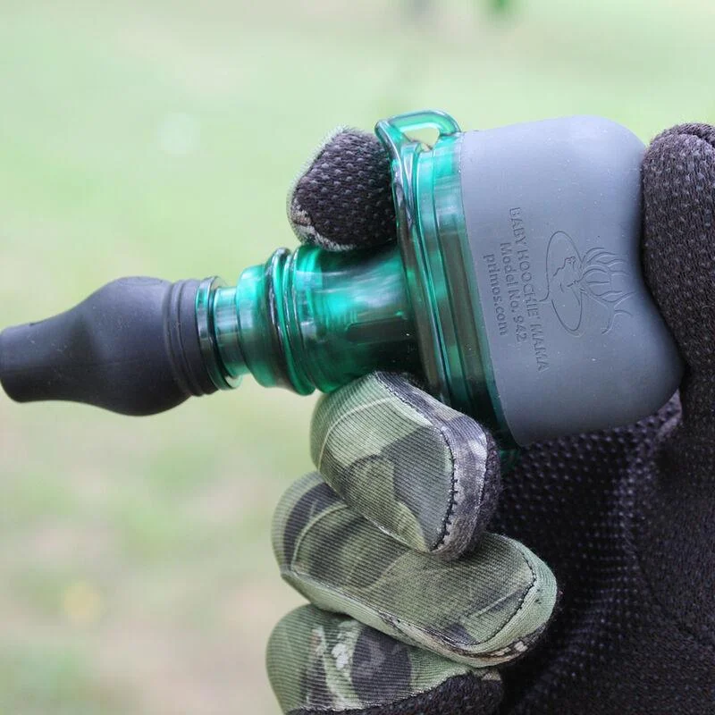 primary-21196 Primos Baby Hoochie Mama Elk Call, green and gray call held in a gloved hand