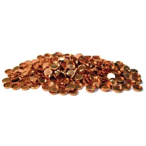 Lyman Gas Checks, pile of copper-coloured cup-shaped pieces