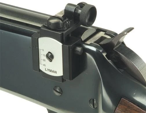 Lyman Receiver Peep Sights 66 Receiver Peep Sights, black rear sight mounted on a rifle receiver