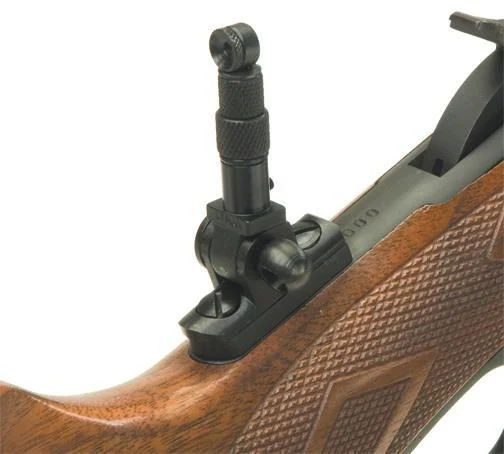 Lyman Tang Sight #2, black sight mounted on a checkered wood-stock rifle, side view