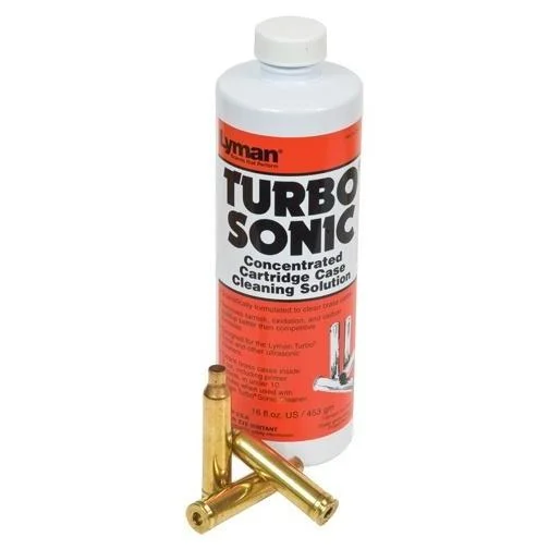 Lyman Turbo Sonic cleaner solution in white 16 oz bottle with red label and brass cases