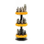 Lyman Turret Stand, front view with three yellow rotating tiers holding assorted dies