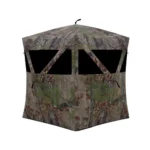 Barronett Blinds Road Runner Ground Blind, front view in woodland camo with dark window openings