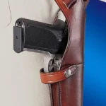 Bianchi Model X15 Shoulder Holster brown right-side view worn with handgun grip and shoulder strap visible