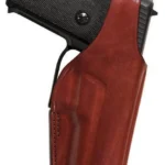 Bianchi Model 19L Thumbsnap holster, right-side view in plain tan leather holding a handgun