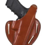Bianchi Model 7 Shadow II, tan leather right-hand holster holding a black handgun