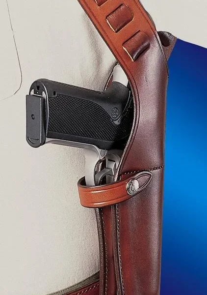 Bianchi Model X15 Vertical Shoulder Holster, tan leather side view with pistol and shoulder straps
