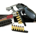 Bianchi Model 585 Speed Strips black strips shown with cartridges, package, belt and revolver