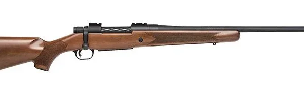 Mossberg Patriot side view with walnut stock, black barrel and bolt action