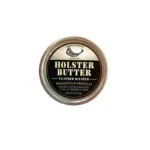 Hunter Holster Butter, round metal tin with black and gold label, front view