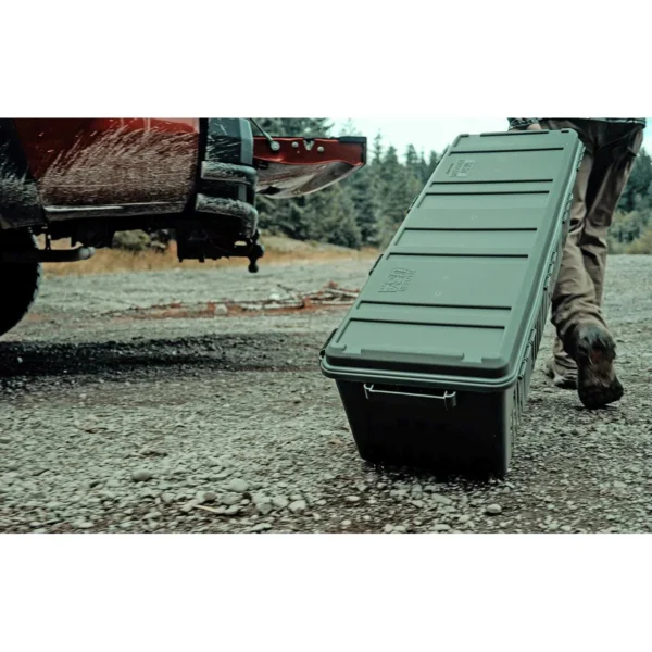 MTM The Mule Mobile Gear Crate, army green wheeled crate being pulled outdoors