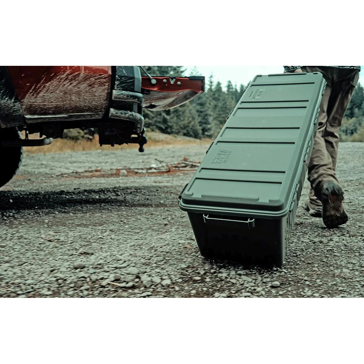 primary-23605 MTM The Mule Mobile Gear Crate, army green wheeled crate being pulled outdoors