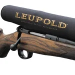 Leupold Neoprene Scope Cover, black side view fitted over a scope on a wood-stock rifle