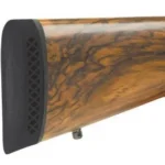 Pachmayr Deluxe Recoil Pad, black rear pad shown mounted on a brown wood stock