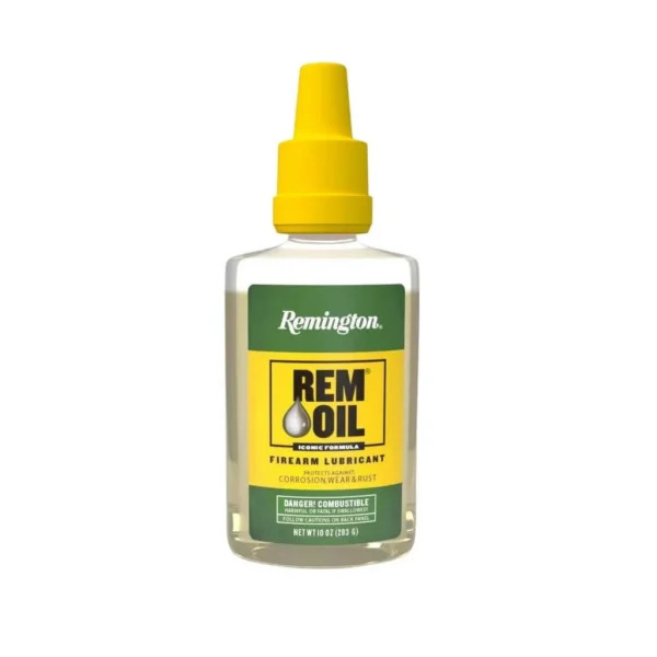Remington REM-OIL, clear bottle with green label and yellow dispensing cap, front view