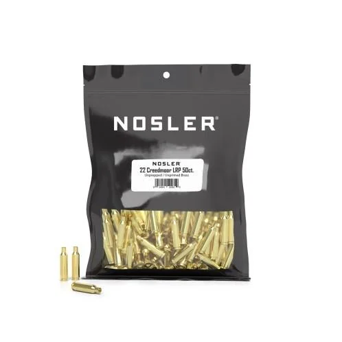 Nosler Unprimed Bulk Brass 22 Creedmoor bag with visible brass cases and three loose cases