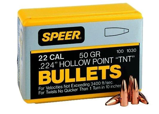Speer TNT Rifle Bullets, yellow and gray box in front view with loose copper bullets