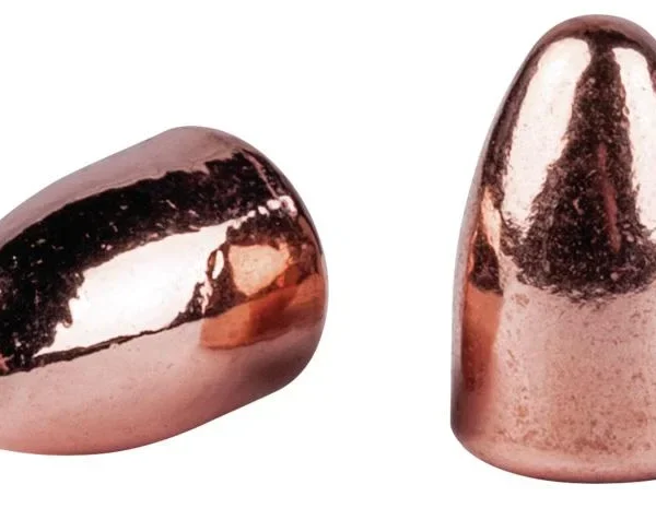 Speer Copper Plated Handgun Bullets, two copper-coloured round-nose bullets at angled views