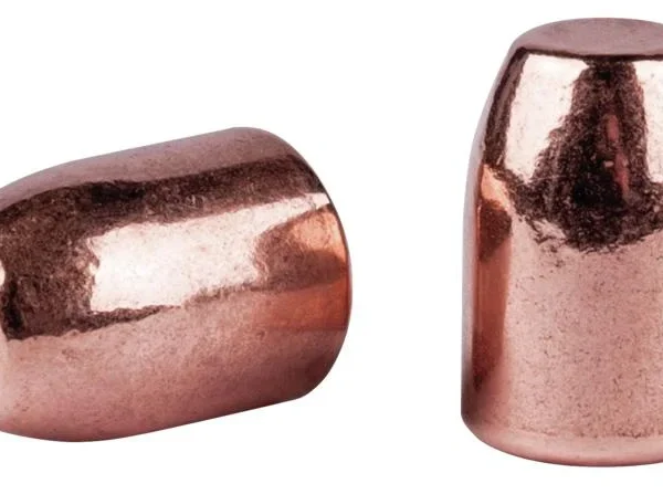 Speer Copper Plated Handgun Bullets, two copper bullets shown upright and on their side