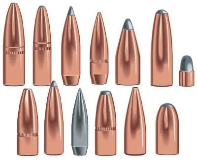 Speer Grand Slam copper-coloured rifle bullets arranged upright in assorted views