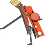 Champion Flight Master Jr. - 3/4 Trap, angled view of orange trap with spring and throwing arm