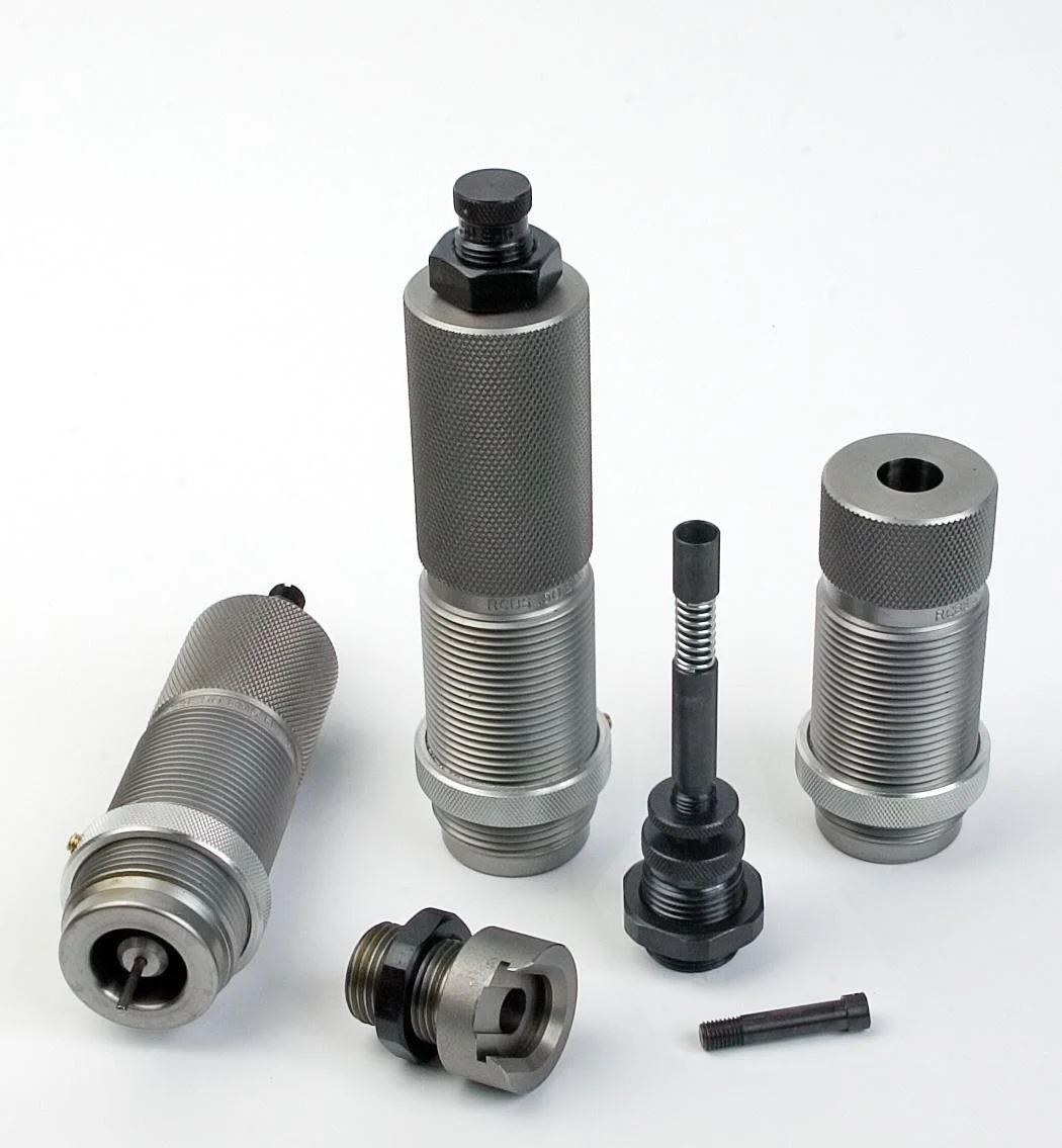 primary-29303 RCBS AmmoMaster .50 BMG Die Kit, silver and black dies and components arranged upright and flat