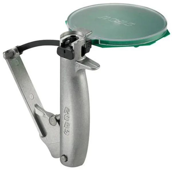 RCBS Hand Priming Tool, gray metal handheld tool with green circular tray, angled view