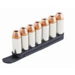 Tuff Products Quickstrips Speed Strips, black strip holding seven silver and copper cartridges