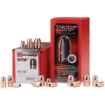Hornady Handgun Bullets XTP red boxes with copper-coloured hollow-point bullets arranged in front