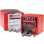 Hornady Lead Round Ball, red Black Powder boxes with loose gray round balls, front view