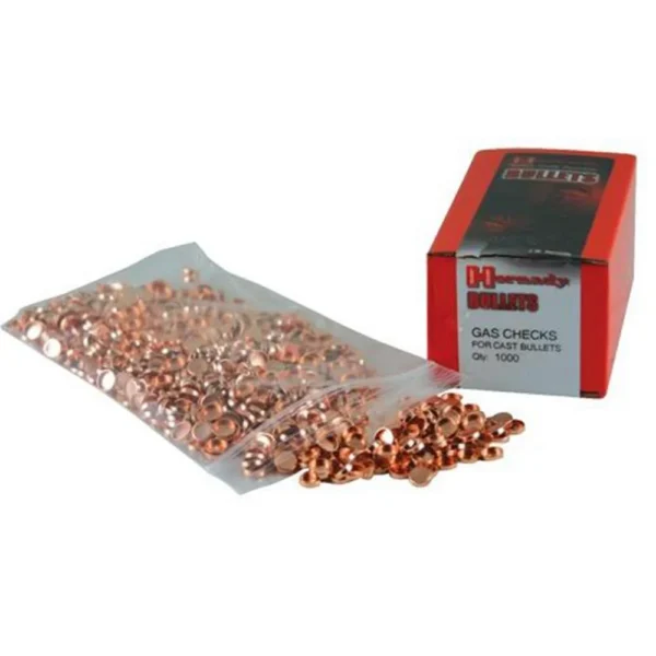 Hornady Crimp-On Gas Checks, copper cups spilling from a clear bag beside a red box