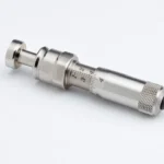 Hornady Metering Insert, silver metal insert in angled side view with knurled end