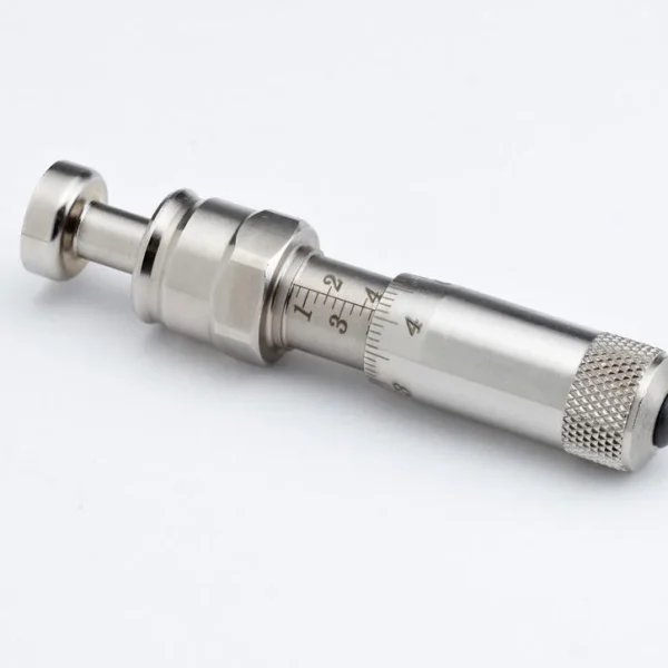 Hornady Metering Insert, silver metal insert in angled side view with knurled end